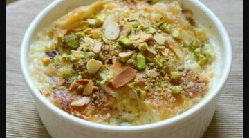 طريقة عمل أم علي بالمكسرات والقشطة